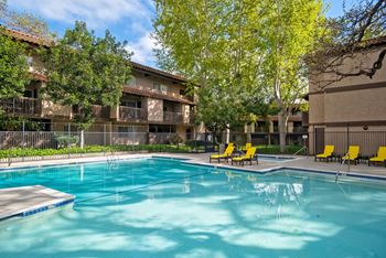 Swimming pool area with chairs